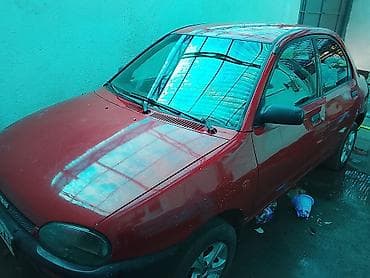 mini vci: Mazda 121: 1993 г., 1.3 л, Механика, Бензин, Седан — 1