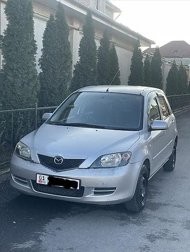 лейсан машина: Mazda Demio: 2003 г., 1.3 л, Автомат, Бензин, Хэтчбэк — 1