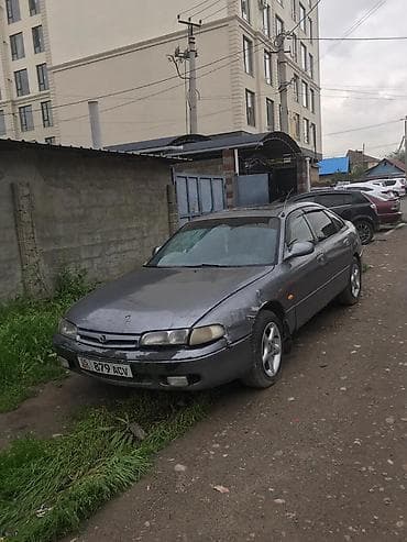 step 2: Mazda 626: 1996 г., 1.8 л, Бензин, Лифтбек — 2