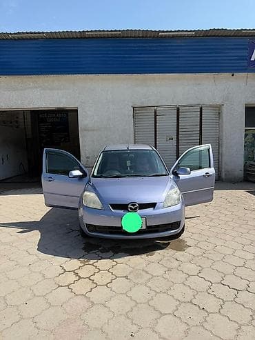 ниссан марч 1998: Mazda Demio: 2005 г., 1.3 л, Автомат, Бензин, Хэтчбэк — 5