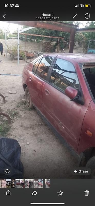 aion v plus: Nissan Almera (седан), красный цвет, кузов P11. Описание: - — 4