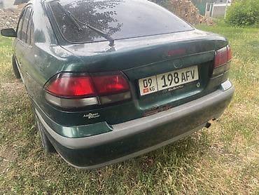 Mazda 626: 1999 г., 2 л, Механика, Бензин, Седан