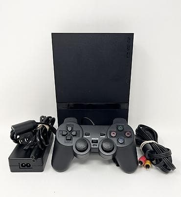 Sony PlayStation 2 Slim. Консоль в отличном состоянии, полностью
