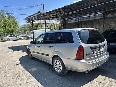 школа фабия: Ford Focus: 2001 г., 1.6 л, Ручные, Бензин, Универсал — 6