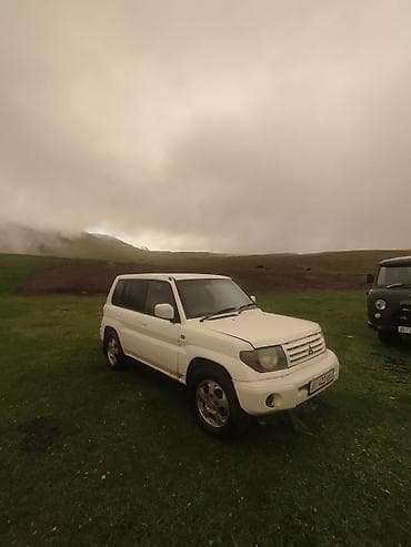 хиундай портер: Mitsubishi Pajero iO: 1999 г., 1.8 л, Автомат, Бензин, Внедорожник — 3