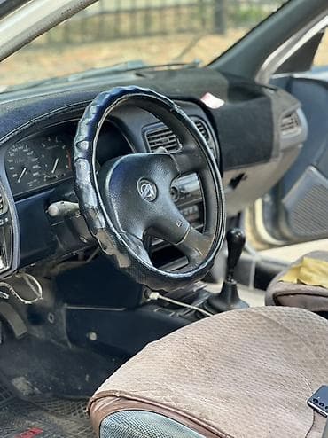 124 e500: Nissan Primera: 1993 г., 2 л, Механика, Бензин, Седан — 6