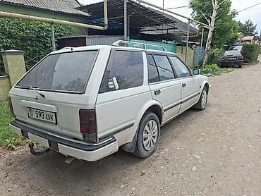 devo tiko: Nissan Bluebird: 1990 г., 2 л, Механика, Дизель, Универсал — 5