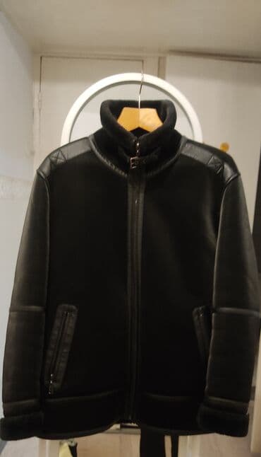 Плащи: Продаю Мужская дублёнка (пилот) черного цвета. 52 размер. - Материал — 4