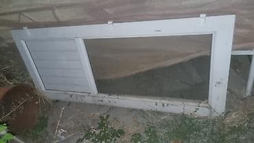 Раздвижная дверь/окно из ПВХ с одной глухой стеклянной створкой и