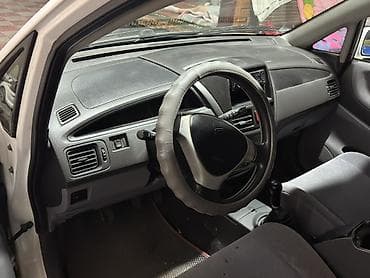 даево такума: Suzuki Liana: 2002 г. — 6