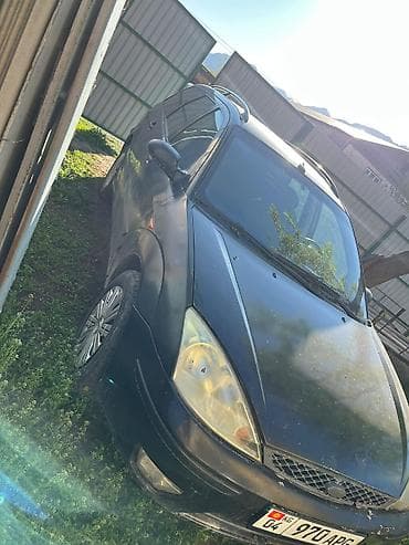 авто выхлоп: Ford Focus: 2003 г., 1.6 л, Ручные, Бензин, Универсал — 5