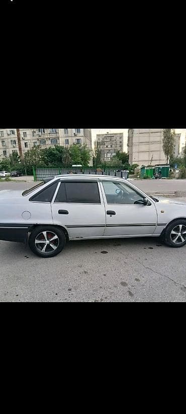 Daewoo Nexia: 2003 г., 1.5 л, Механика, Бензин, Хэтчбэк