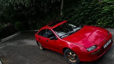rx 7: Mazda 323: 1997 г., Механика, Бензин — 6