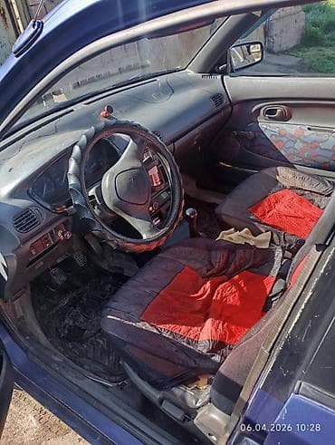 е30 e30: Mazda 121: 1994 г., Механика, Бензин, Хэтчбэк — 4