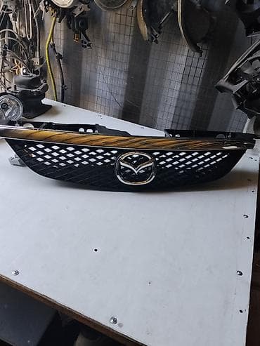 Решетка радиатора Mazda Оригинал