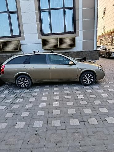 саната желтый: Nissan Primera: 2003 г., 0.2 л, Механика, Бензин, Универсал — 2