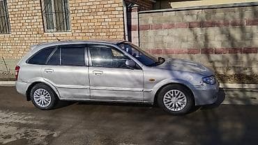 женский машина: Mazda 323: 2002 г., 1.6 л, Автомат, Бензин, Хэтчбэк — 6