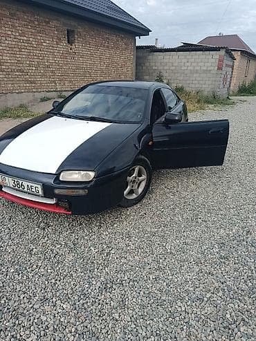 Mazda 323: 1998 г., 1.6 л, Механика, Бензин, Лифтбек