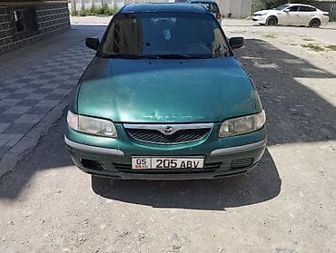 ом 422: Mazda 626: 1998 г., 1.8 л, Механика, Бензин, Седан — 4