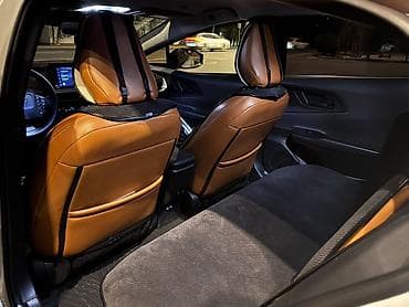 byd e9: Toyota Prius: 2023 г., 2 л, Вариатор, Гибрид, Лифтбек — 7