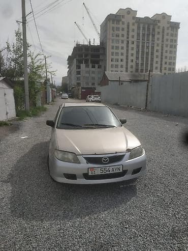 Mazda Familia: 2001 г., 1.5 л, Автомат, Бензин, Седан