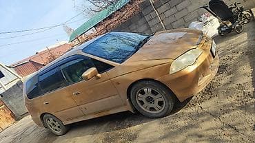 автомобиль для детей: Продаётся компактвэн/универсал золотистого цвета. Кузов: - 5 дверей — 1