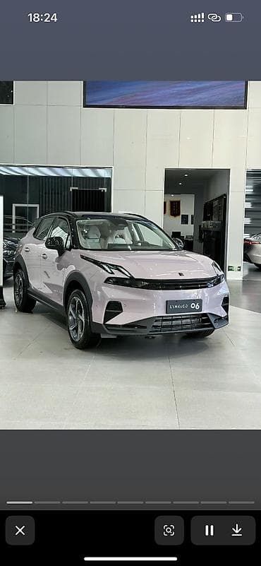 дом вогон: Модель Lynk & Co 06 2026 года отличается белым экстерьером, черным — 1