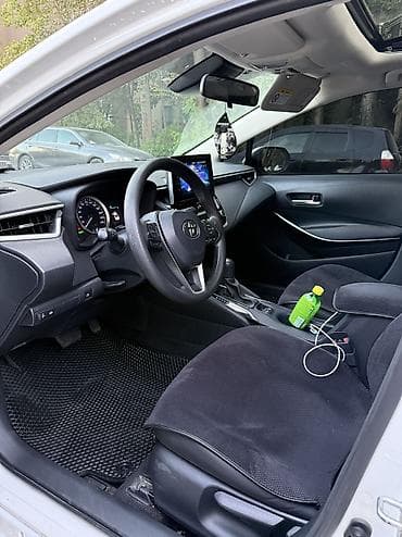 byd e2 2023: Toyota Corolla: 2020 г., Гибрид, Седан — 7