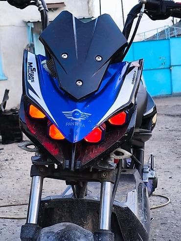 перья: Скутер Pantera. - Яркая передняя оптика: две основные фары — 3