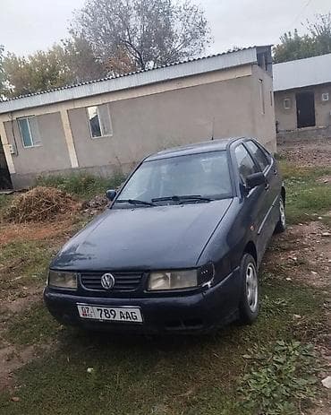 Volkswagen Polo: 1998 г., 1.4 л, Механика, Бензин, Хэтчбэк