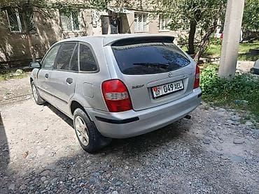 купить авто мазда трибют: Mazda 323: 2000 г., 1.5 л, Механика, Бензин, Хэтчбэк — 7