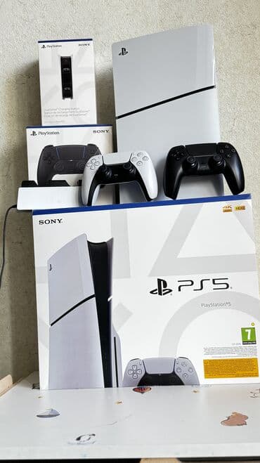 телевизор для плейстейшен 4: Sony PlayStation 5 с зарядкой для джойстиков и скачаными играми — 3