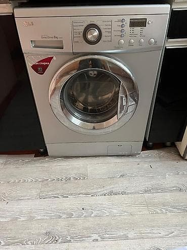 стиральная машинка б: Стиральная машина LG фронтальная, серебристая, Direct Drive 6 кг — 1