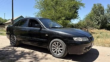 Транспорт: Mazda 626: 2001 г., 2 л, Механика, Бензин, Седан — 2