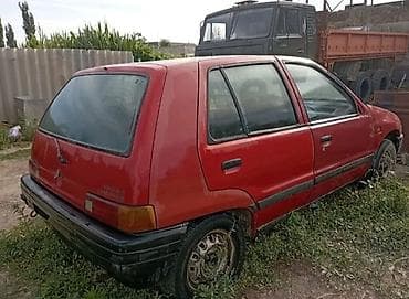 Daihatsu Charade: 1992 г., 1 л, Механика, Бензин — 6