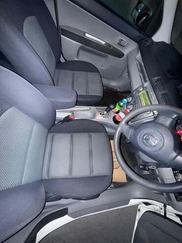 чехол на демио: Mazda Demio: 2003 г., 1.5 л, Типтроник, Бензин, Седан — 4