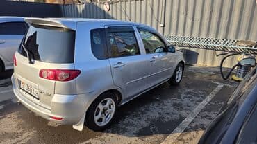 продаю или меняю с доплатой мне: Mazda Demio: 2004 г., 1.3 л, Автомат, Бензин — 5