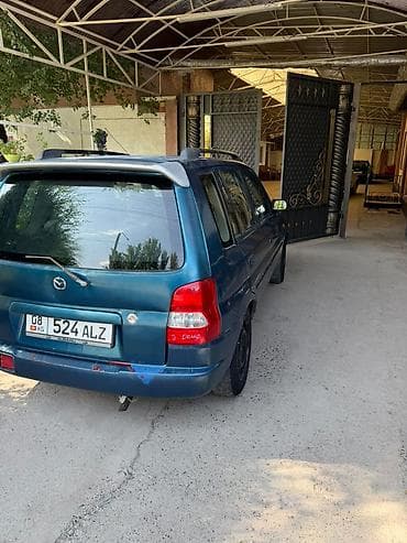 машина капейка: Mazda Demio: 1999 г., 1.5 л, Механика, Бензин — 2