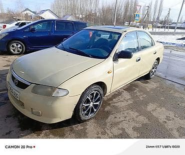 sprinter 4 4: Mazda 323: 1995 г., 1.6 л, Автомат, Бензин, Седан — 4