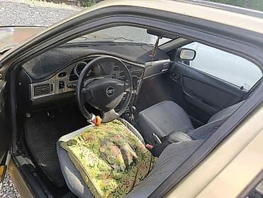 катализатор дордой: Daewoo Nexia: 2010 г., 1.6 л, Кол менен иштөөчү, Бензин, Седан — 4