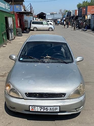 tayota progres: Седан компакт-класса, серебристый цвет, 4 двери, 5 мест. Легкосплавные — 3