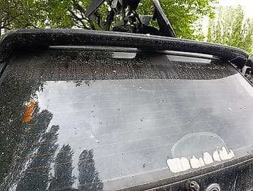 установка люка на авто: Задний спойлер Ssangyong — 1