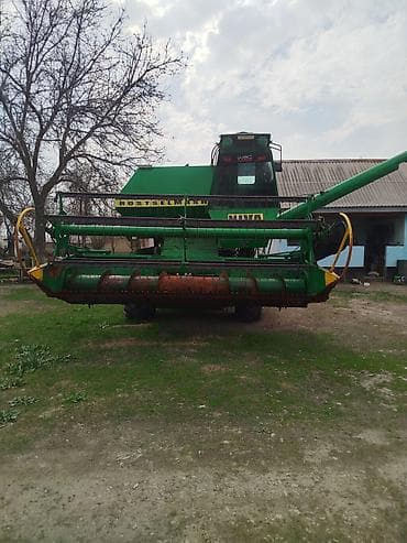 mazda kapella: Зерноуборочный комбайн (самоходный) Описание: - Классическая схема с — 8