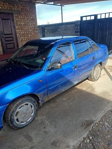 daewo damas: Daewoo Nexia: 2012 г., Бензин, Седан — 3