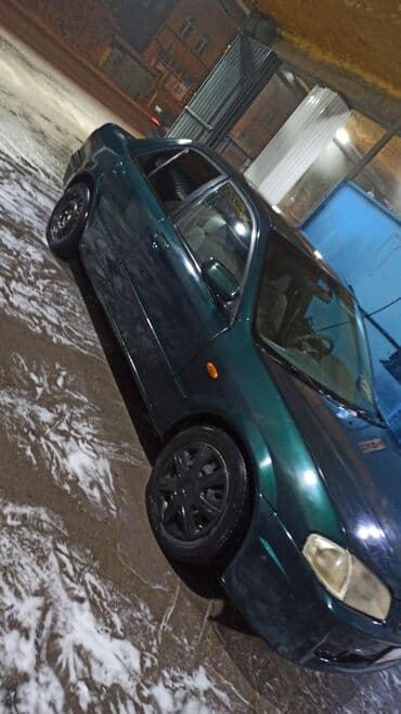 продаю или меняю на дом: Mazda 323: 2000 г., 1.6 л, Механика, Бензиновая, Седан — 10