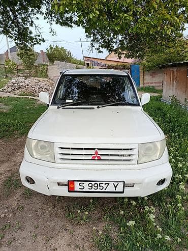 daihatsu core: Mitsubishi Pajero iO: 1999 г., 2 л, Механика, Бензин, Внедорожник — 4
