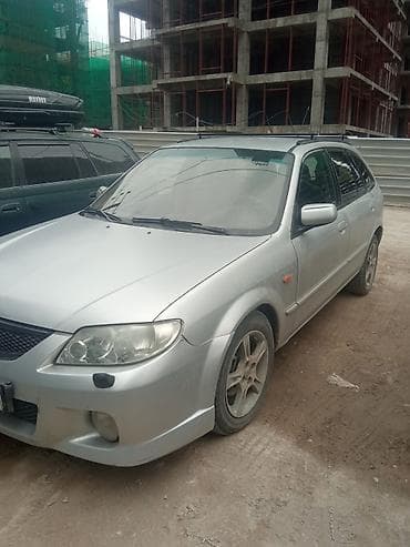 Mazda 323: 2003 г., Универсал