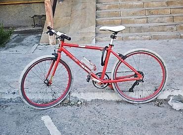 Велосипеды: Городской велосипед с rigid-рамой и рулём MTB-формы Характеристики: - — 4