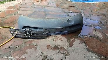 Передний бампер + решётка радиатора Mercedes-Benz. Комплектация: -