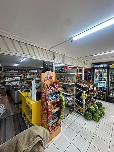 спичка: Продуктовый магазин “Аман” (небольшой формат у дома) Описание: - — 1